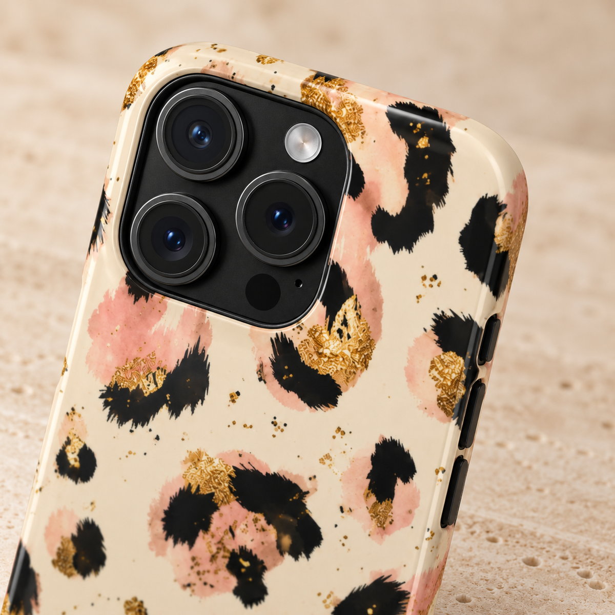 Golden Leopard phone case with card holder, leopard spots with gold flecks on cream, lifestyle close-up of the camera