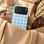 Baby Blue Gingham MagSafe case, baby blue gingham checks, lifestyle photo in a handbag