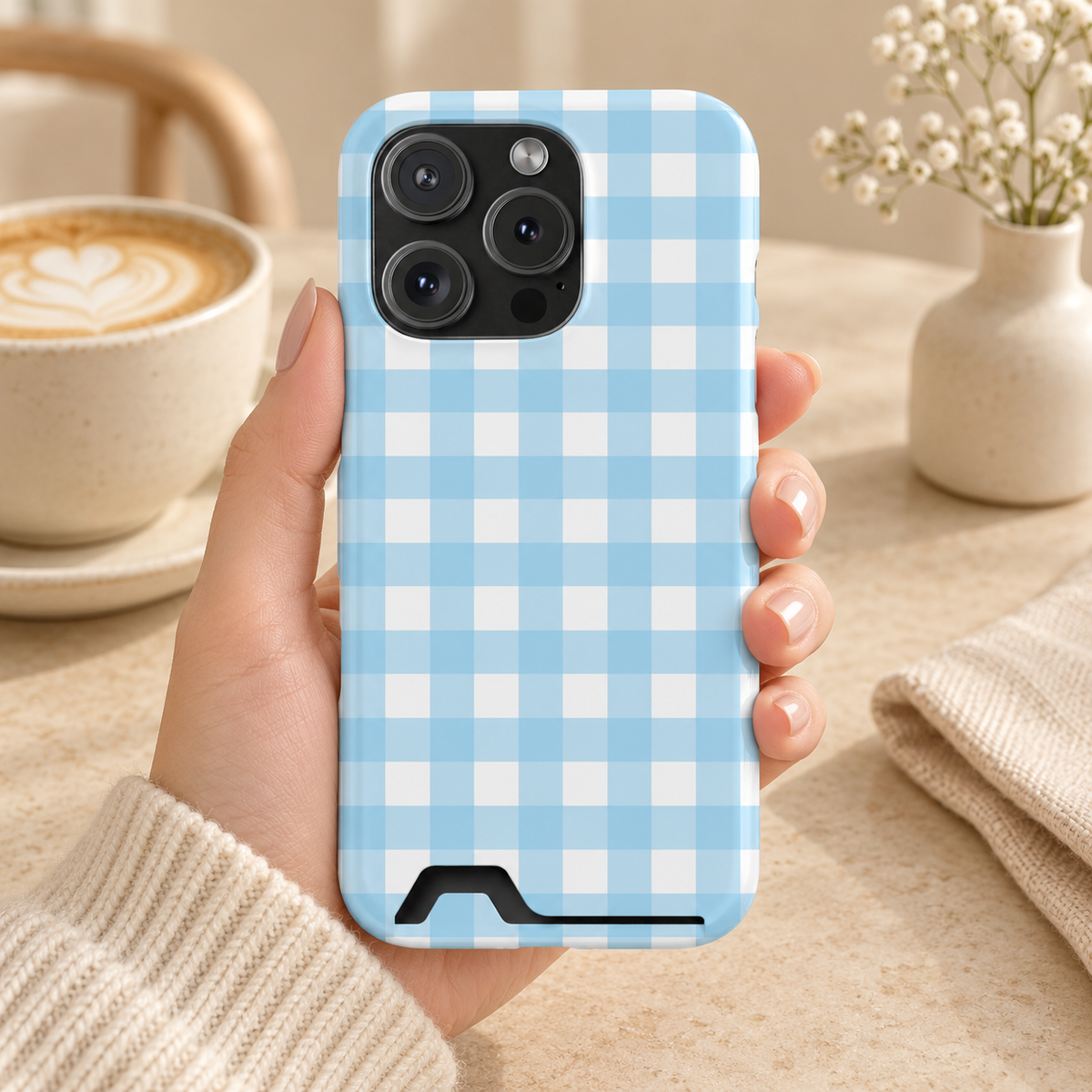 Baby Blue Gingham phone case with card holder, baby blue gingham checks, lifestyle photo in hand with coffee
