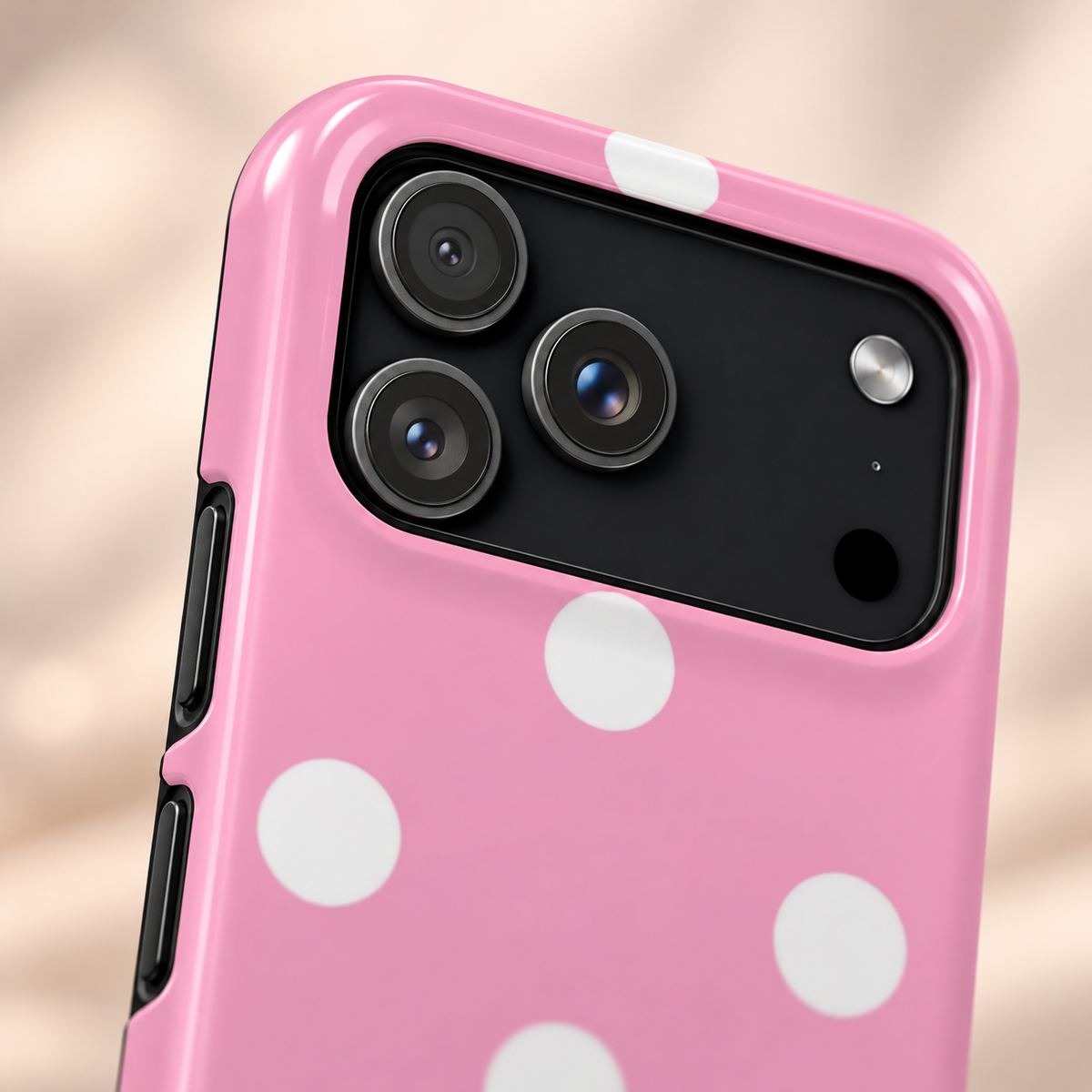 Big Pink Polka Dot protective phone case, big white polka dots on pink, lifestyle close-up of the camera