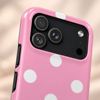 Big Pink Polka Dot phone case with card holder, big white polka dots on pink, lifestyle close-up of the camera