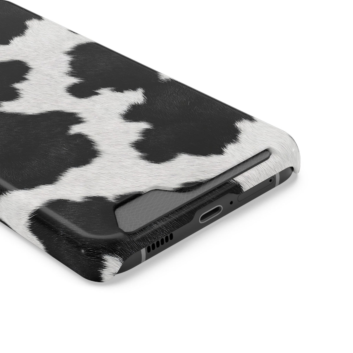 Black Cow Print phone case with card holder, close-up of the card slot