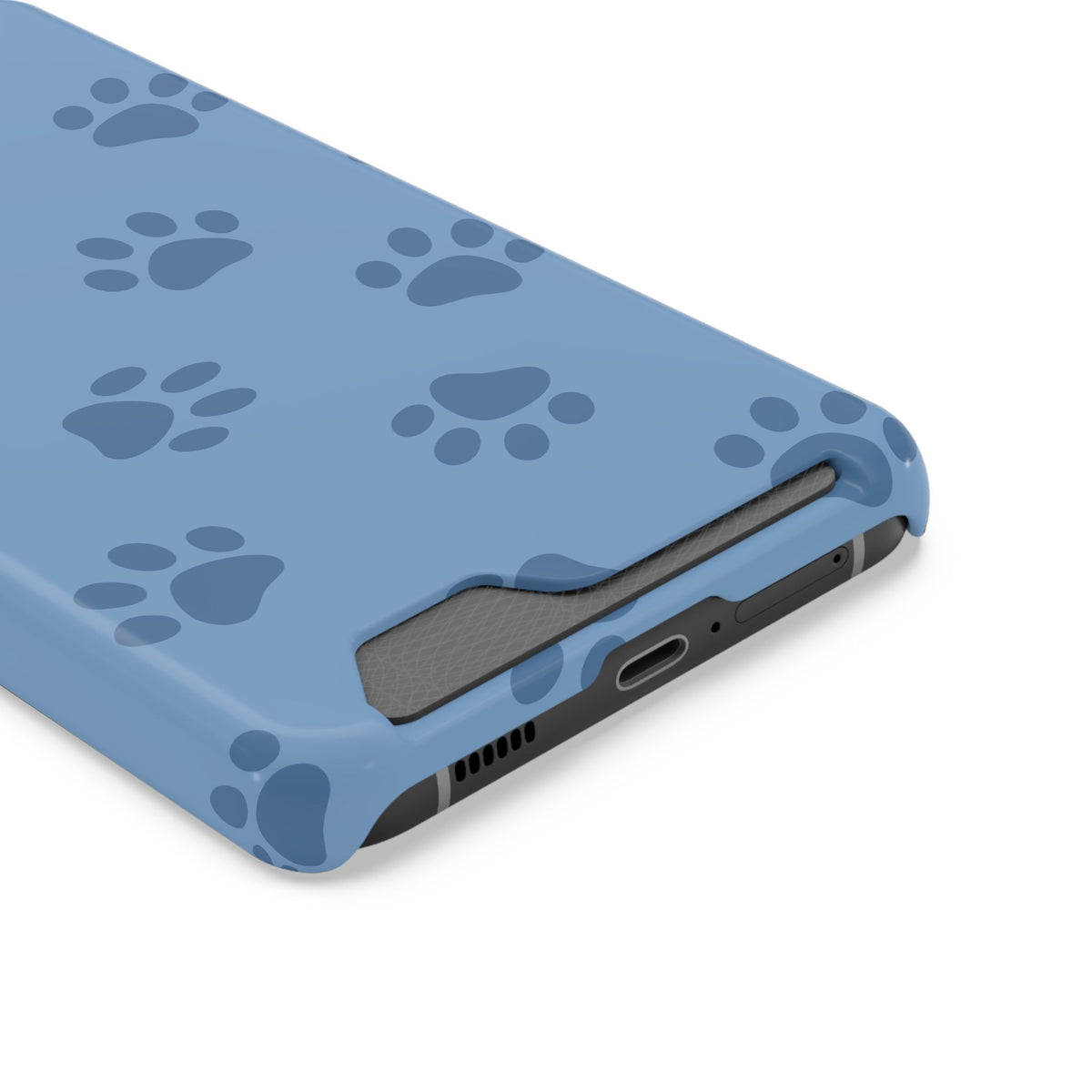 Blue Paw Print phone case with card holder, close-up of the card slot