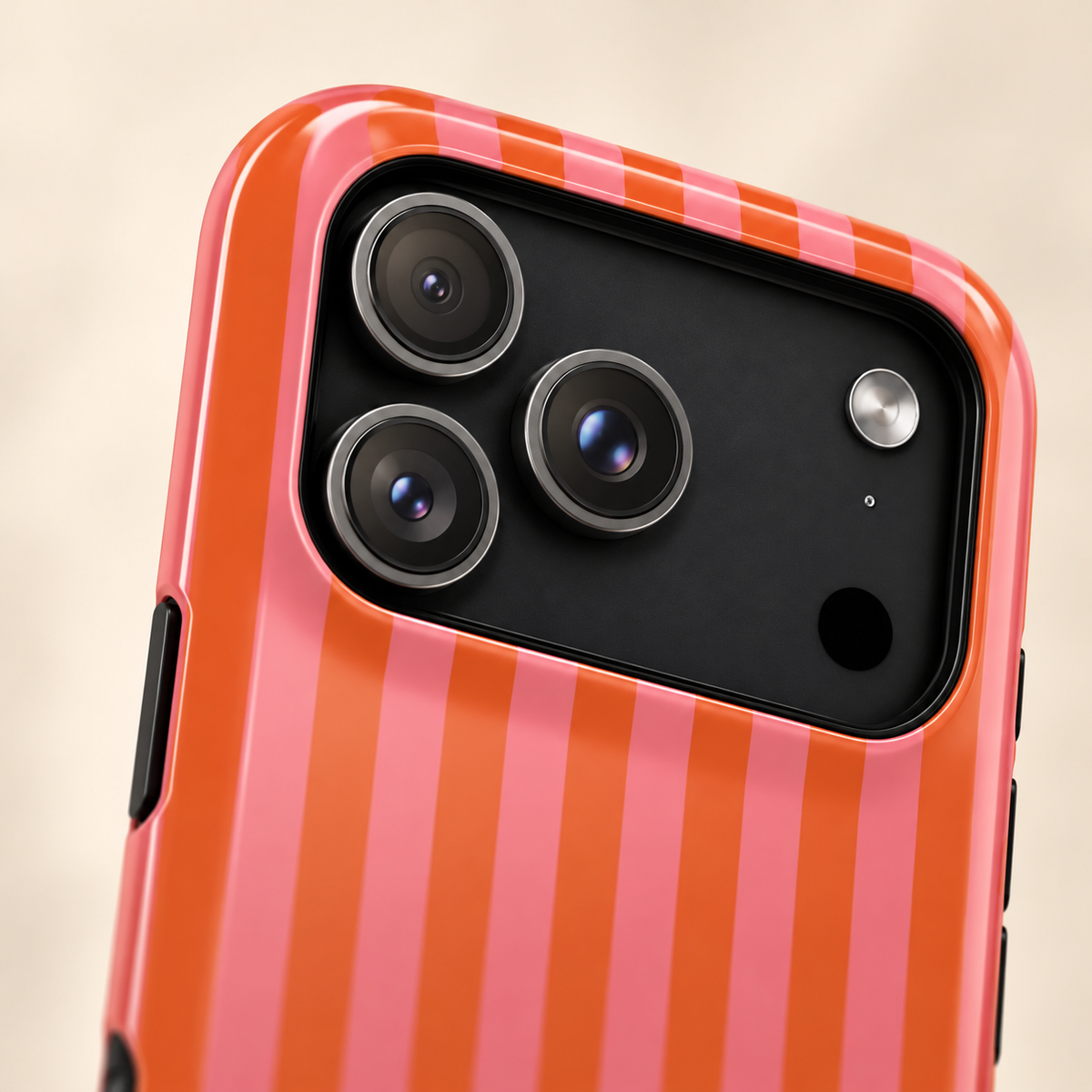 Cabana Stripe MagSafe case, pink and orange stripes, lifestyle close-up of the camera