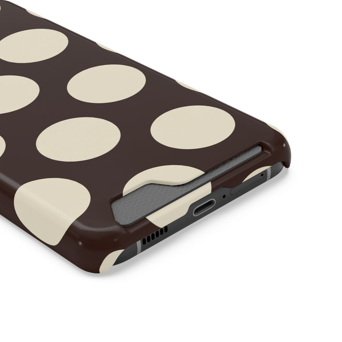Chocolate Polka Dot phone case with card holder, close-up of the card slot