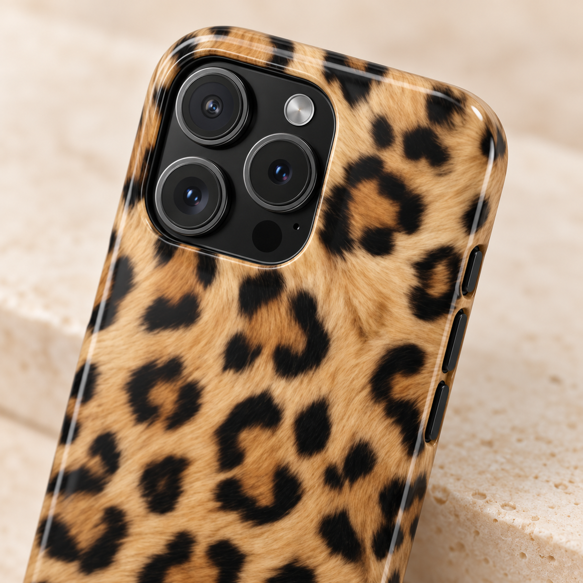 Classic Leopard protective phone case, classic tan and black leopard print, lifestyle close-up of the camera