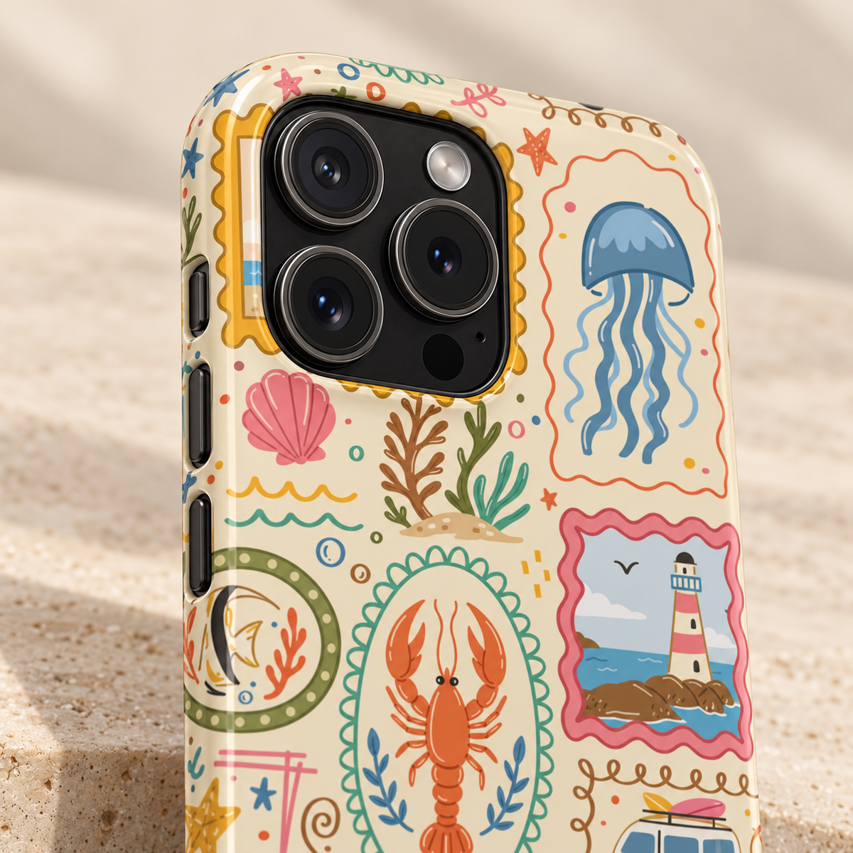 Coastal Postcard phone case with card holder, seaside stamps with jellyfish, lobsters and lighthouses, lifestyle close-up of the camera