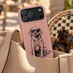 Cool Pup MagSafe case, a line-drawn retriever in shades on dusty pink, lifestyle photo in a handbag