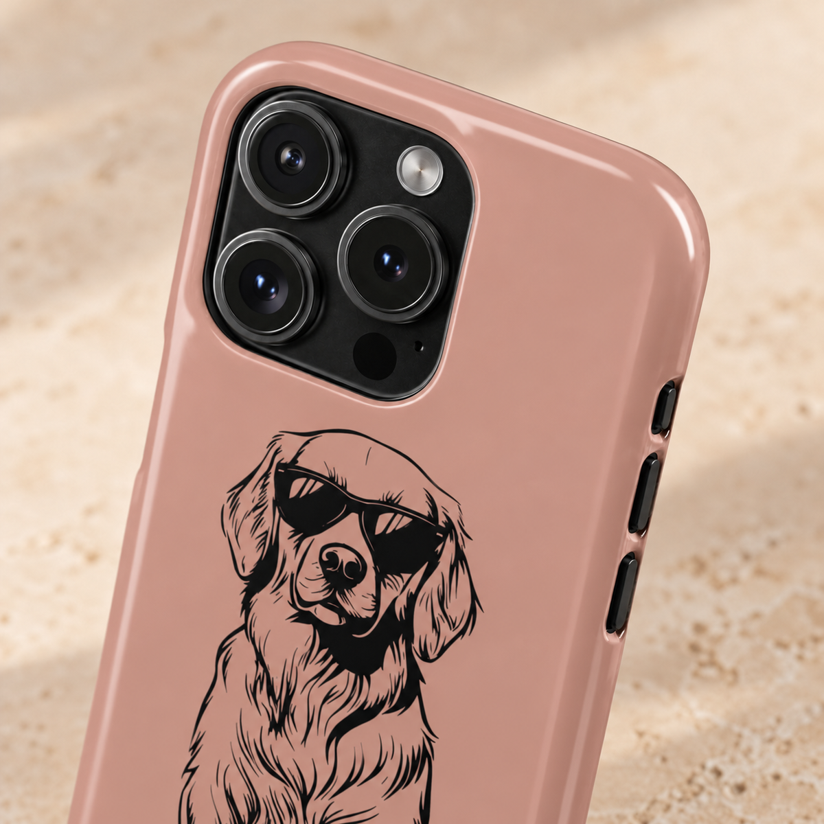 Cool Pup MagSafe case, a line-drawn retriever in shades on dusty pink, lifestyle close-up of the camera