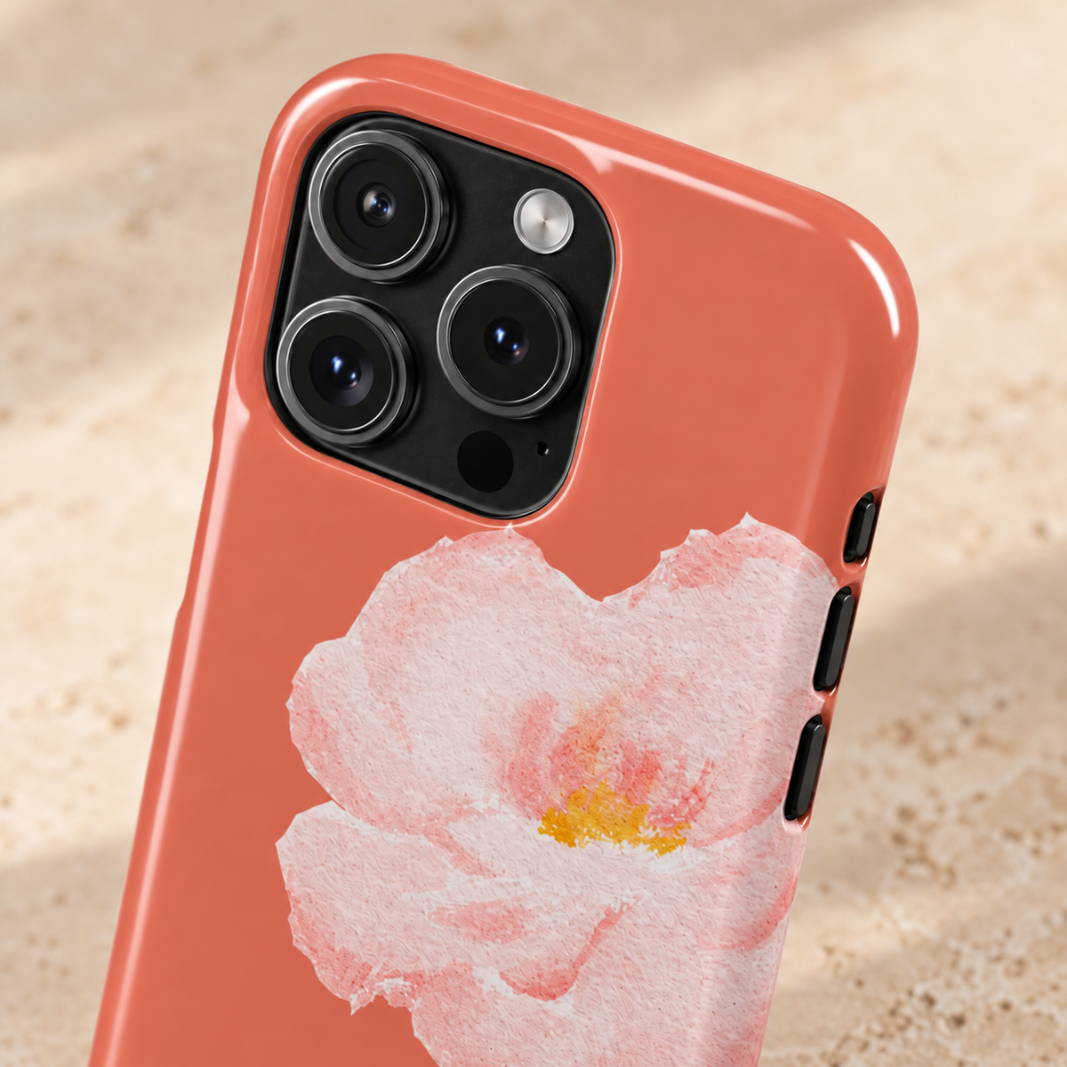 Coral Peony phone case with card holder, a soft pink peony on coral, lifestyle close-up of the camera