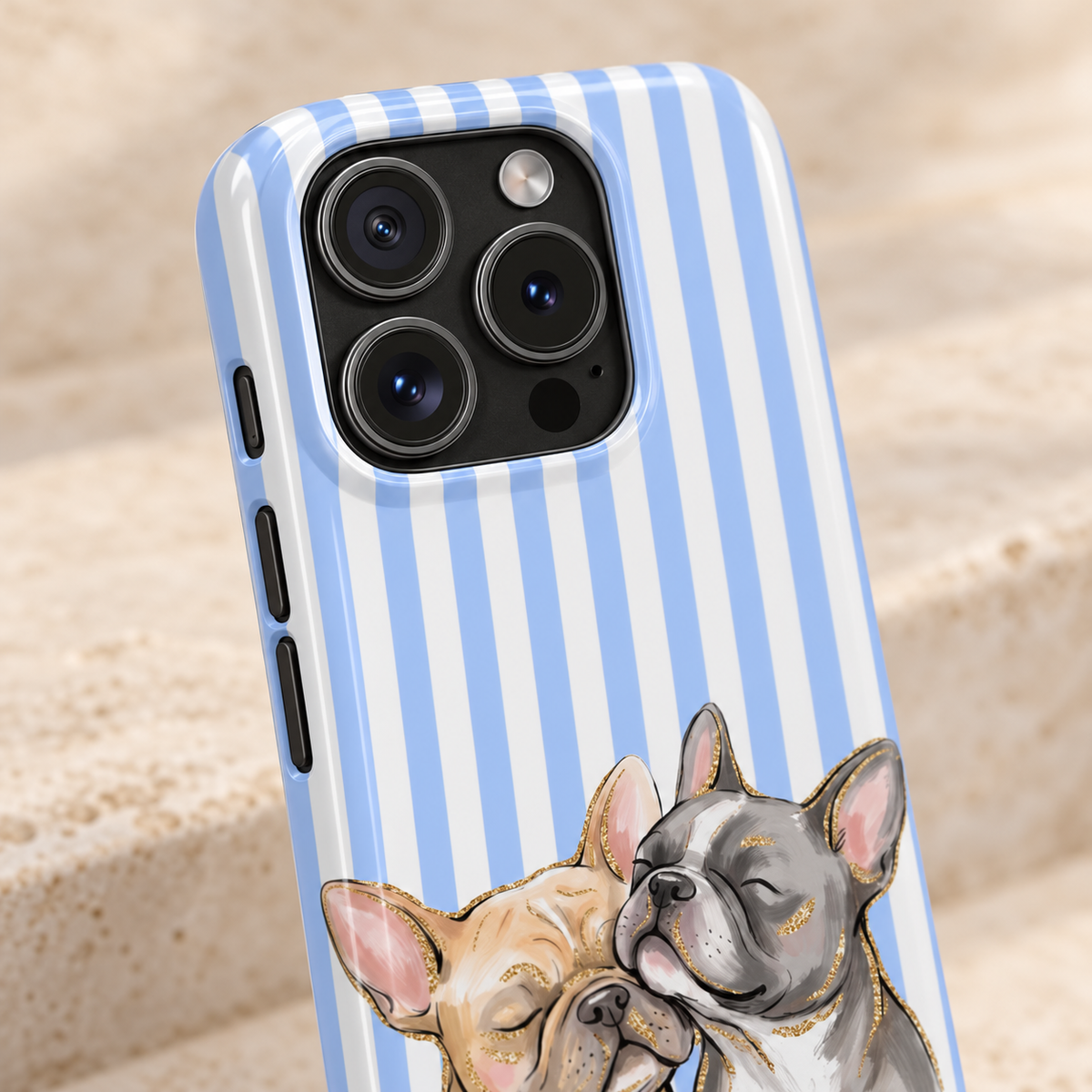 Frenchie Stripe protective phone case, two French bulldogs on baby blue stripes, lifestyle close-up of the camera