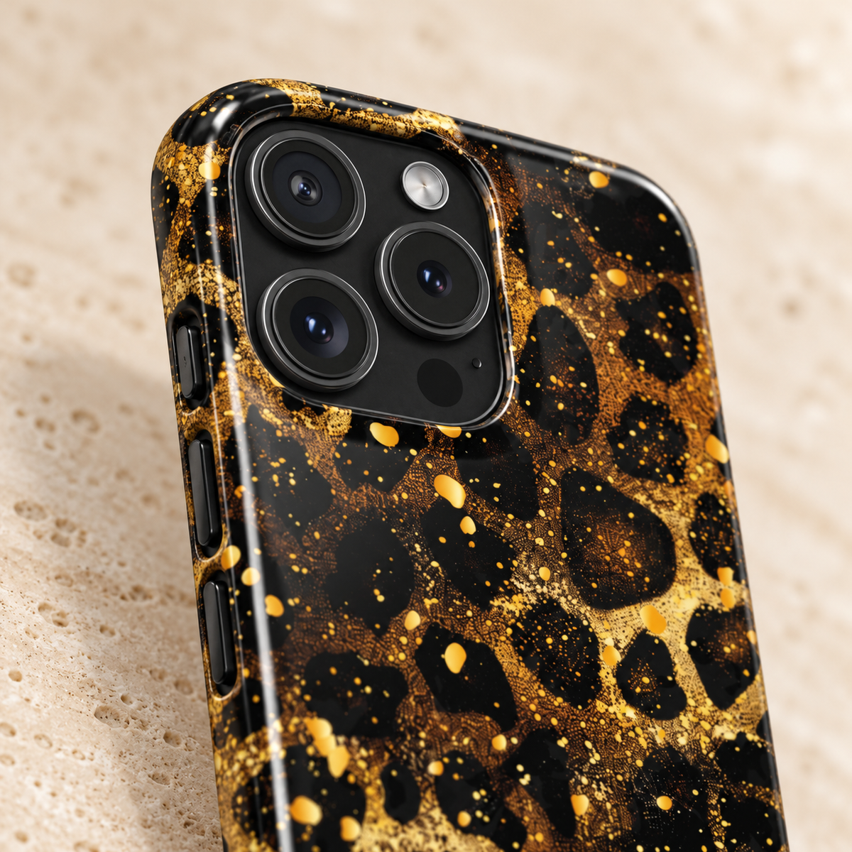 Gilded Leopard protective phone case, gold glitter leopard spots on black, lifestyle close-up of the camera