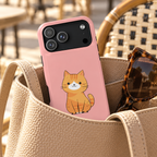 Ginger Kitten phone case with card holder, a ginger kitten on blush pink, lifestyle photo in a handbag