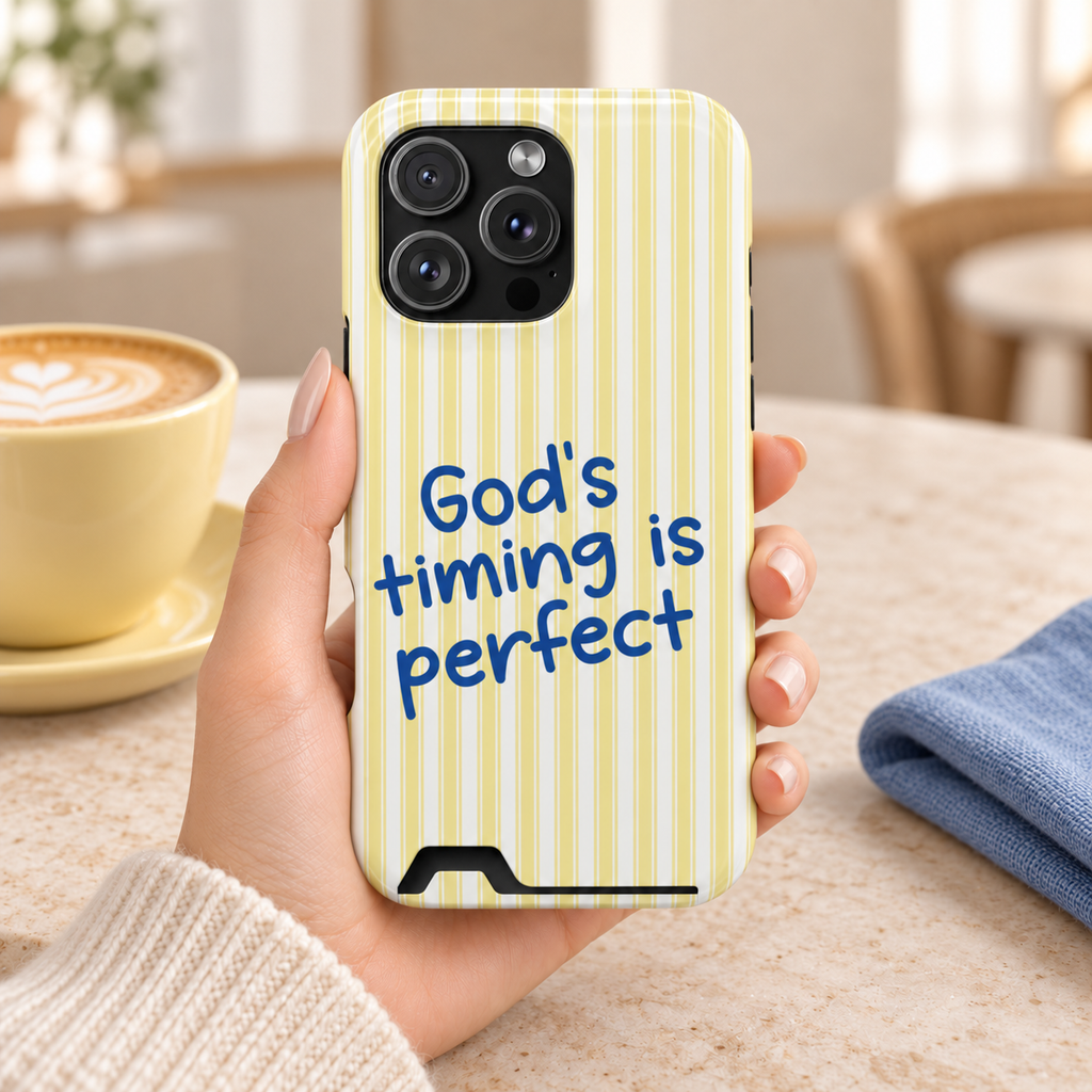 God's Timing phone case with card holder, God's timing is perfect on soft yellow stripes, lifestyle photo in hand with coffee
