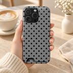 Gray Polka Dot phone case with card holder, black polka dots on soft gray, lifestyle photo in hand with coffee