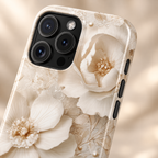 Ivory Blossom protective phone case, ivory blossoms with pearl centers, lifestyle close-up of the camera