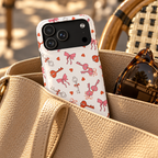 Key to My Heart phone case with card holder, vintage keys, little hearts and pink bows on white, lifestyle photo in a handbag