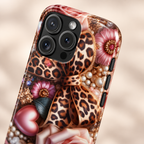 Leopard Rose protective phone case, a leopard bow with pink roses, hearts and pearls, lifestyle close-up of the camera