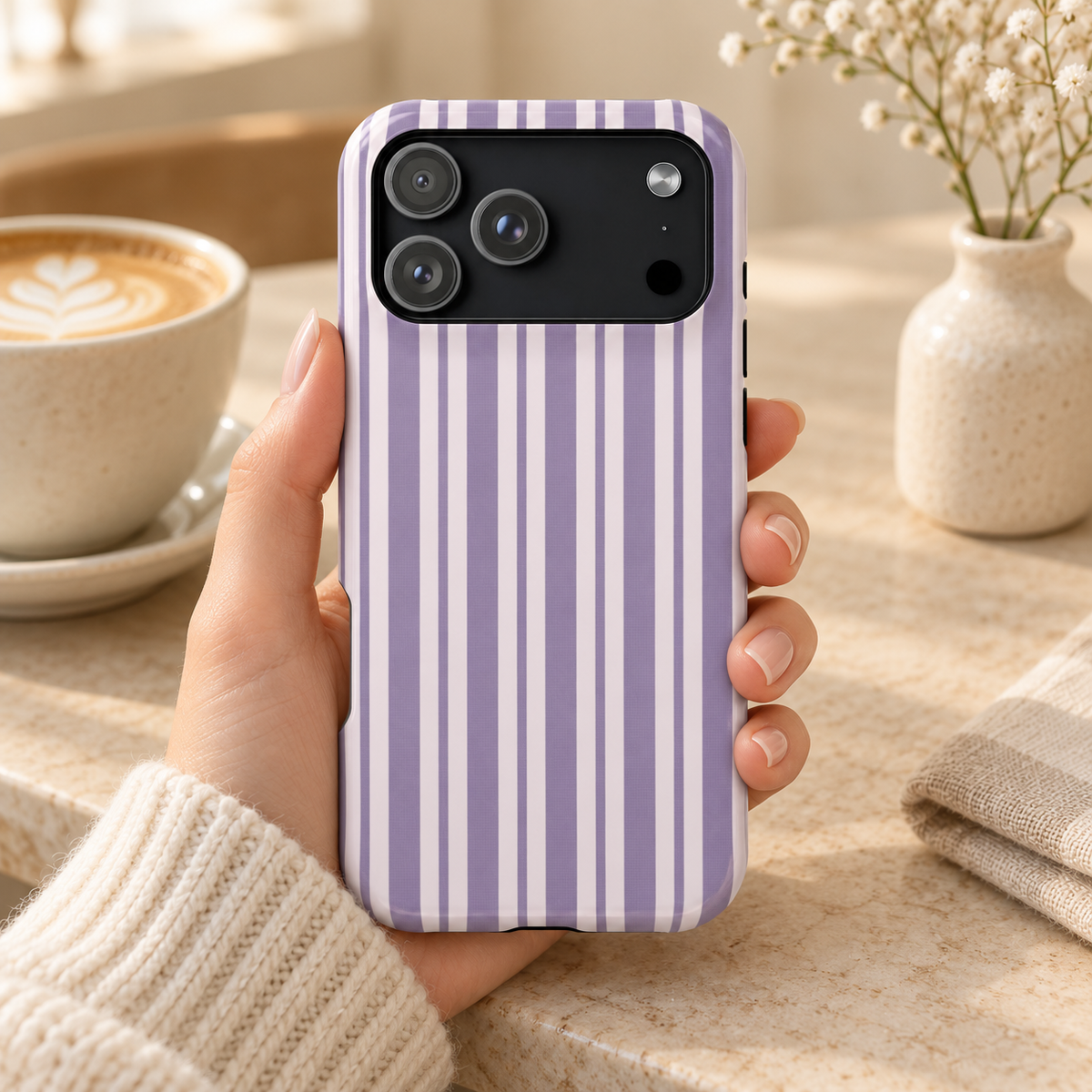 Lilac Stripe MagSafe case, lilac and white stripes, lifestyle photo in a handbag