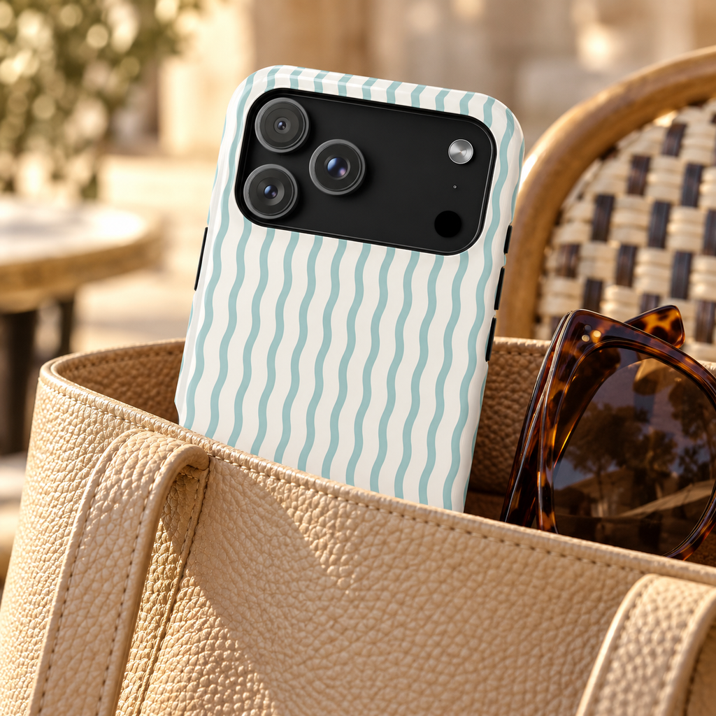 Mint Wave Stripe phone case with card holder, wavy mint green stripes on white, lifestyle photo in a handbag