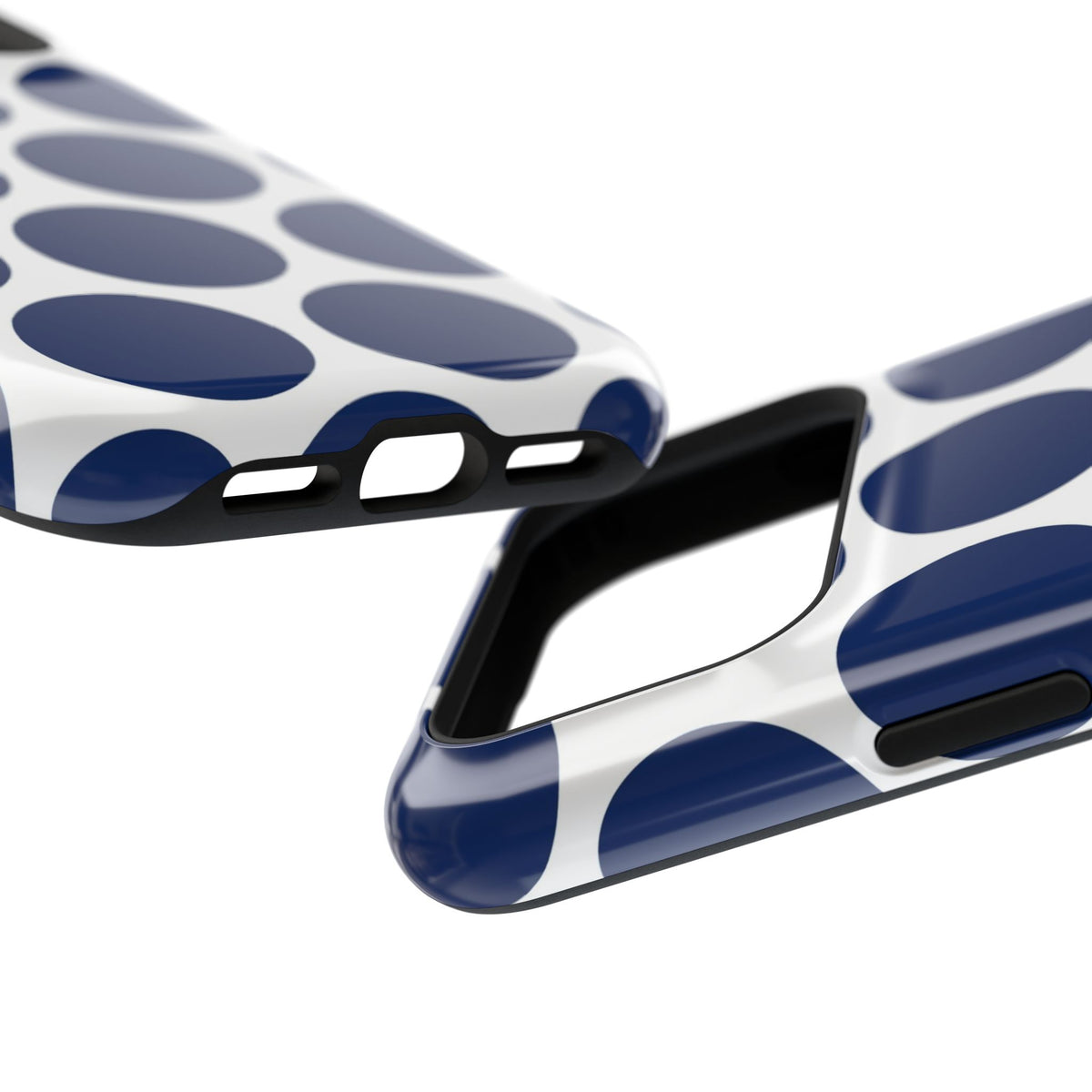 Navy Polka Dot protective phone case, close-up at an angle