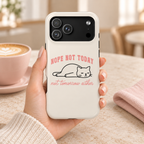 Nope Not Today protective phone case, a lazy cat with Nope Not Today lettering on cream, lifestyle photo in hand with coffee