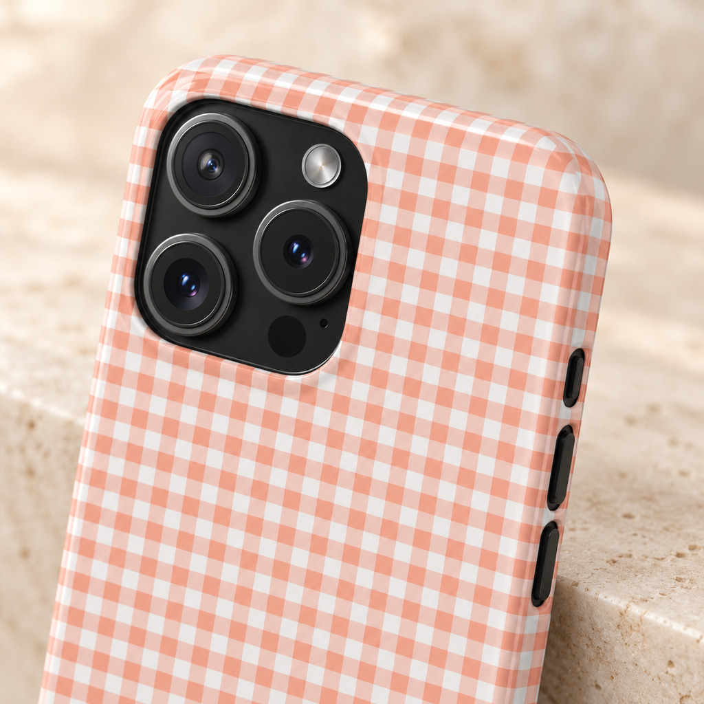 Peach Gingham MagSafe case, peach gingham checks, lifestyle close-up of the camera