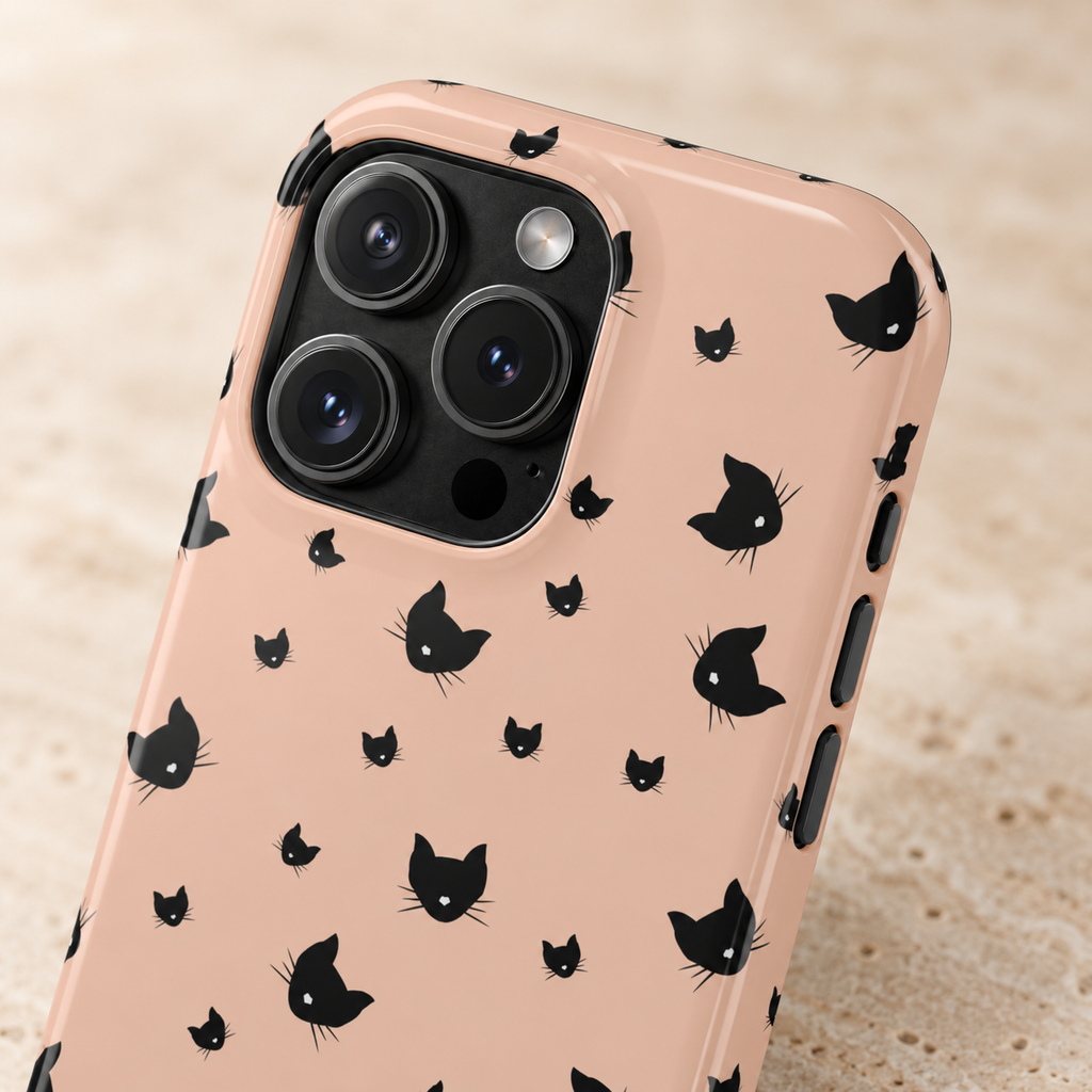 Peach Kitty MagSafe case, little black cats on peach, lifestyle close-up of the camera