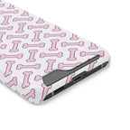 Pink Dog Bone phone case with card holder, close-up of the card slot