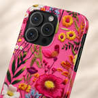 Pink Folk Floral protective phone case, bright folk-style flowers on hot pink, lifestyle close-up of the camera