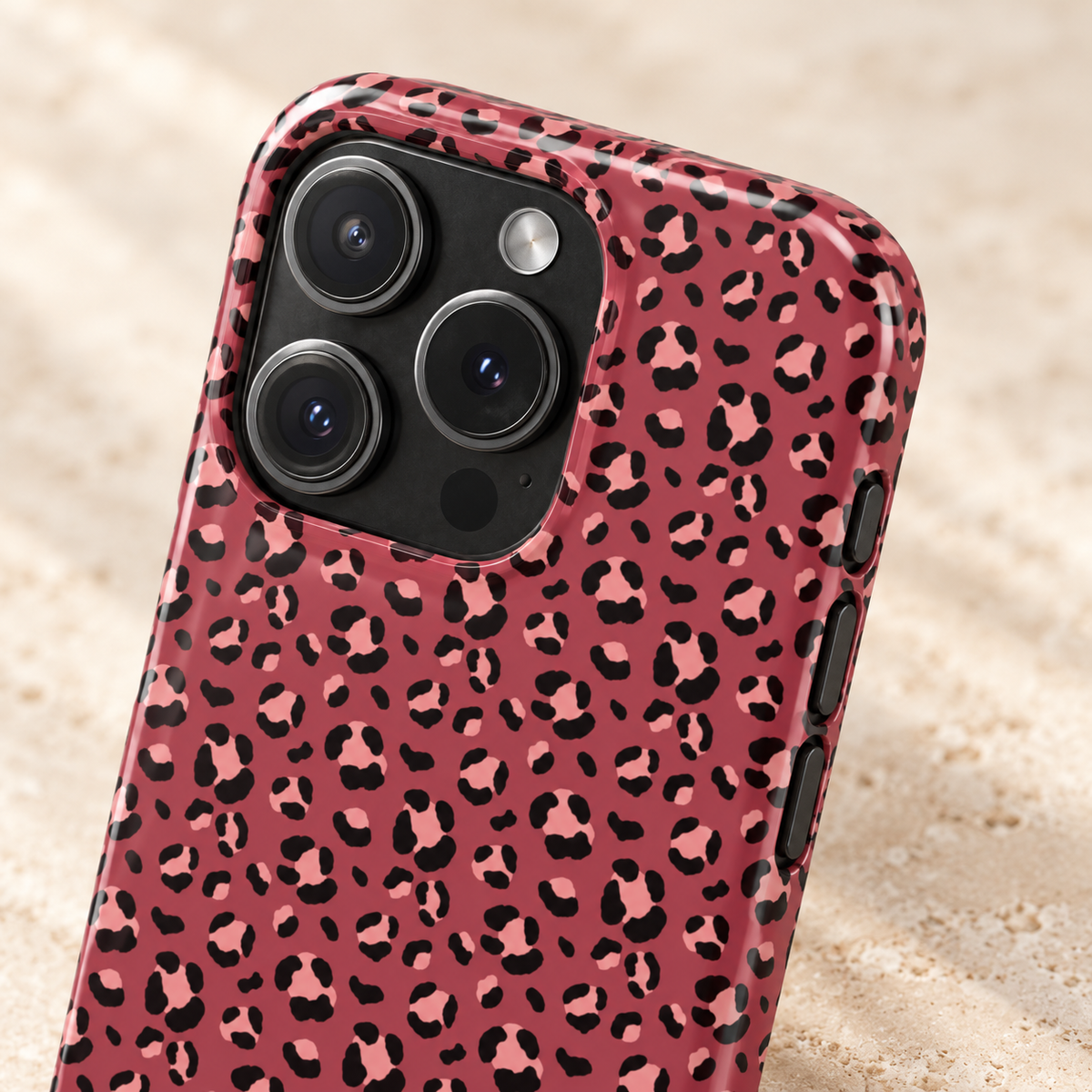 Pink Leopard phone case with card holder, blush leopard spots on raspberry, lifestyle close-up of the camera