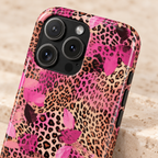 Pink Splash Leopard phone case with card holder, pink brushstrokes over classic leopard, lifestyle close-up of the camera
