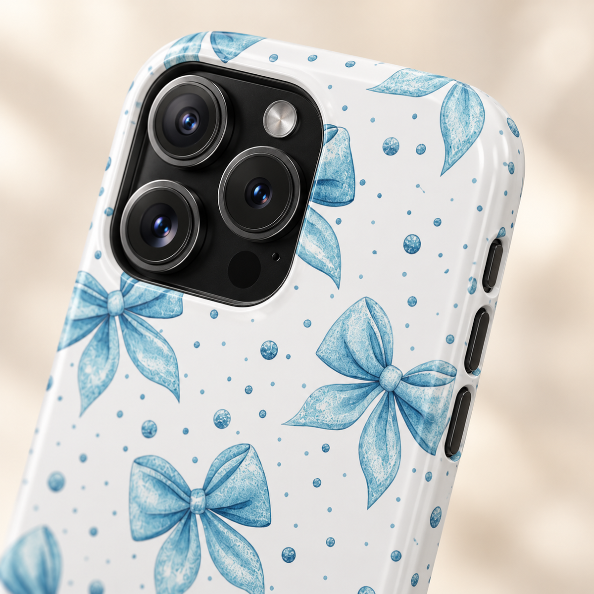 Powder Blue Bow protective phone case, powder blue bows and tiny dots on white, lifestyle close-up of the camera