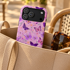 Purple Butterfly protective phone case, purple butterflies on lilac, lifestyle photo in a handbag
