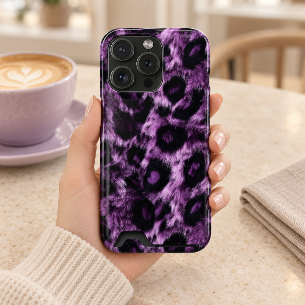 Purple Leopard phone case with card holder, purple and black leopard spots, lifestyle photo in hand with coffee