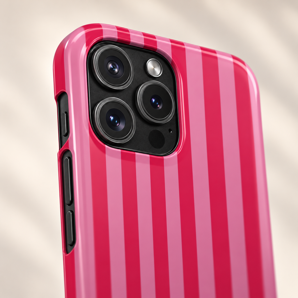 Raspberry Stripe protective phone case, wide raspberry and hot pink stripes, lifestyle close-up of the camera
