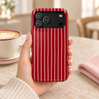 Red Pinstripe protective phone case, white pinstripes on cherry red, lifestyle photo in hand with coffee