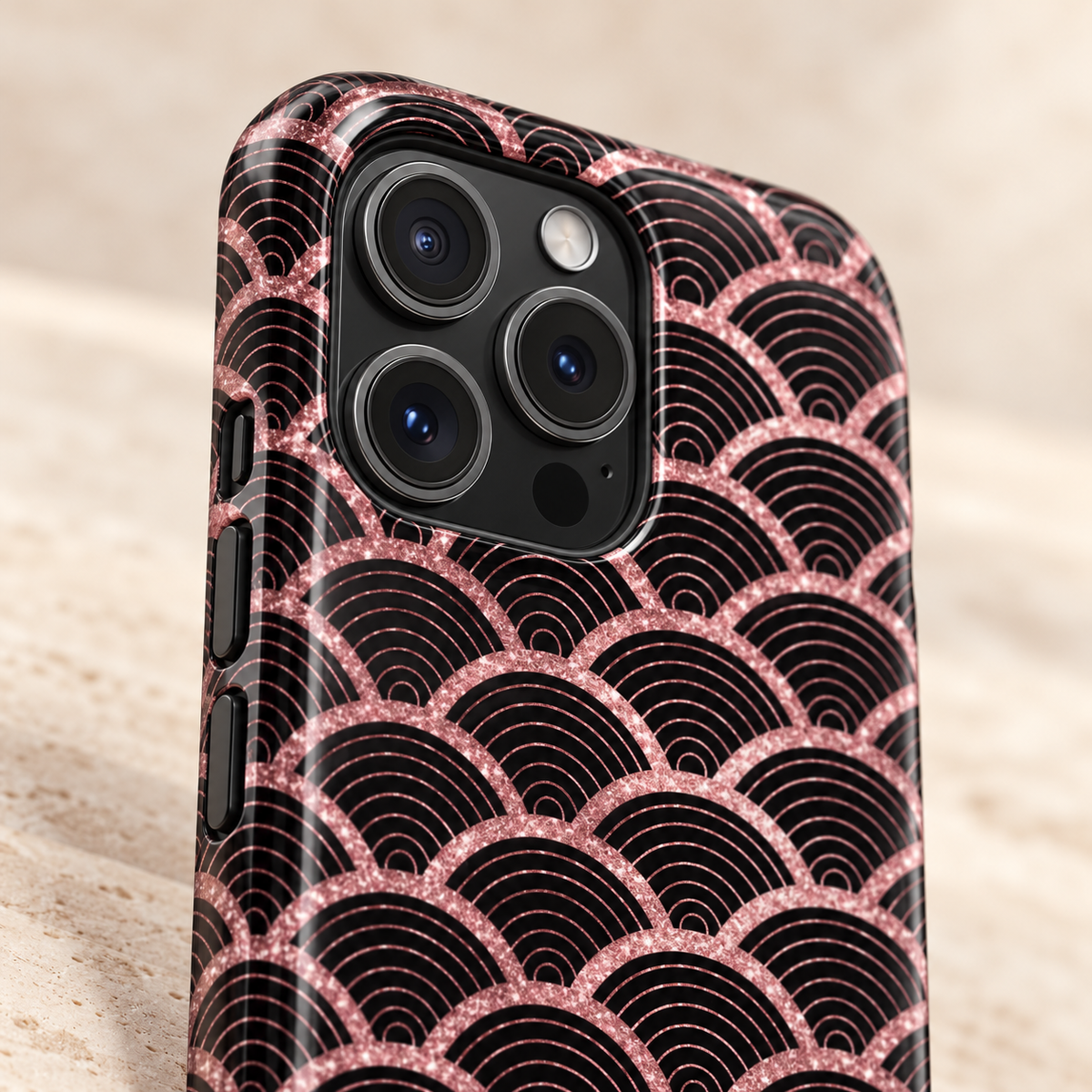 Rose Gold Scale MagSafe case, rose gold mermaid scales on black, lifestyle close-up of the camera