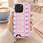 Seashell Ribbon phone case with card holder, seashells, starfish and pink bows in pastel stripes, lifestyle photo in hand with coffee