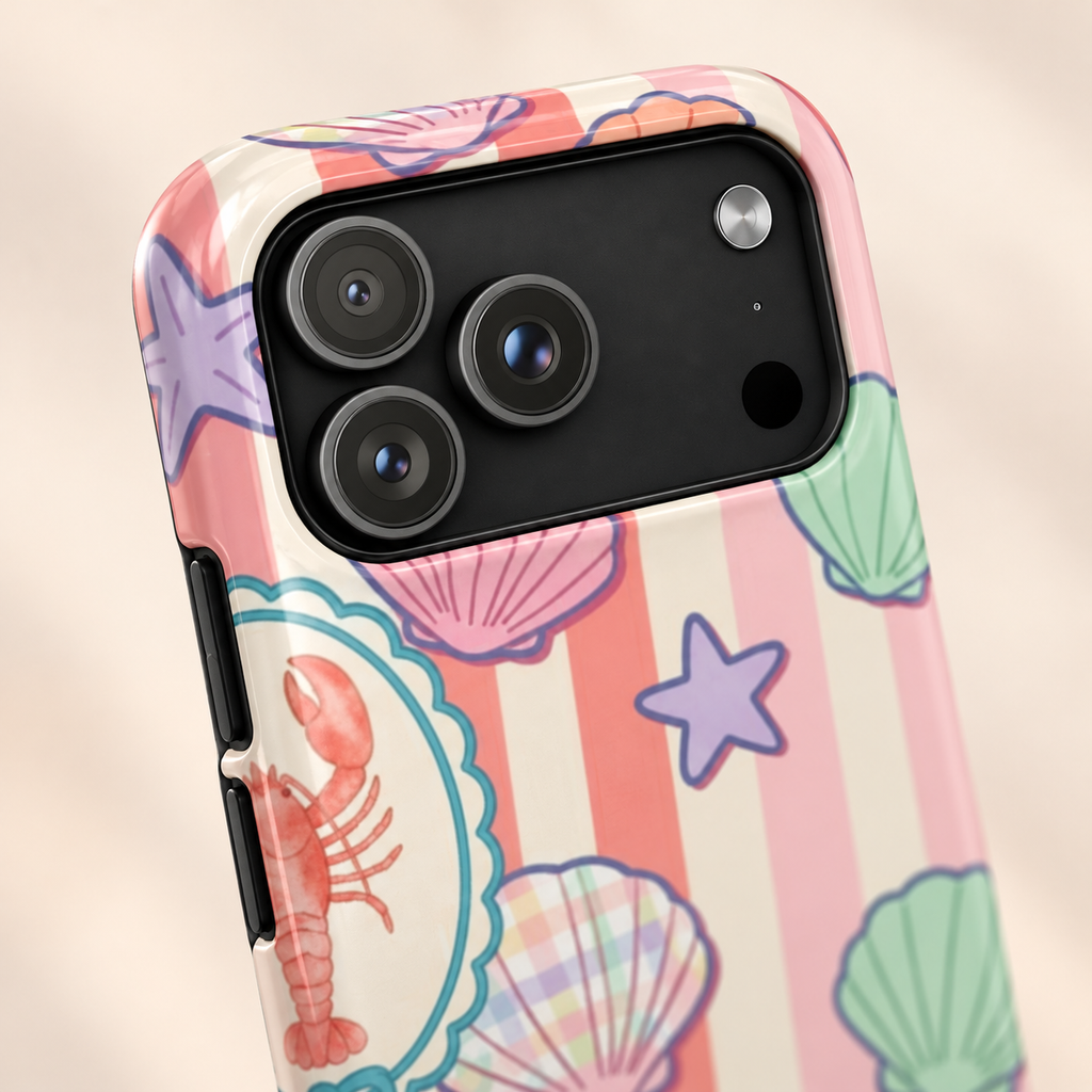 Seashell Stripe protective phone case, seashells and starfish on coral stripes, lifestyle close-up of the camera