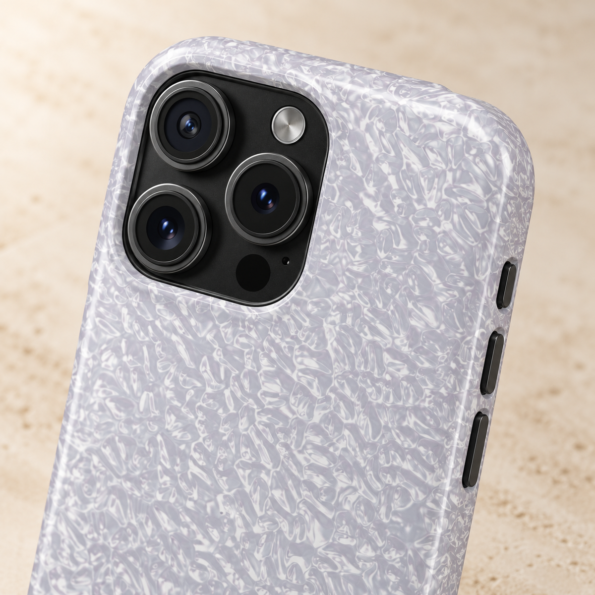 Silver Foil MagSafe case, a crinkled silver foil texture, lifestyle close-up of the camera