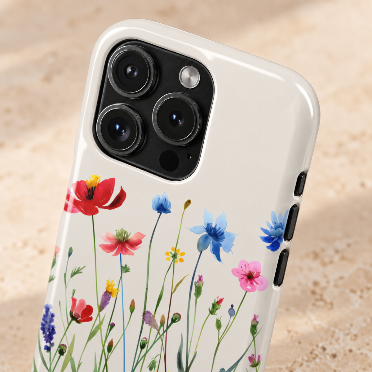 Spring Meadow phone case with card holder, red poppies and blue cornflowers on cream, lifestyle close-up of the camera