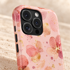 Watercolor Blossom MagSafe case, blush watercolor blossoms with gold flecks, lifestyle close-up of the camera